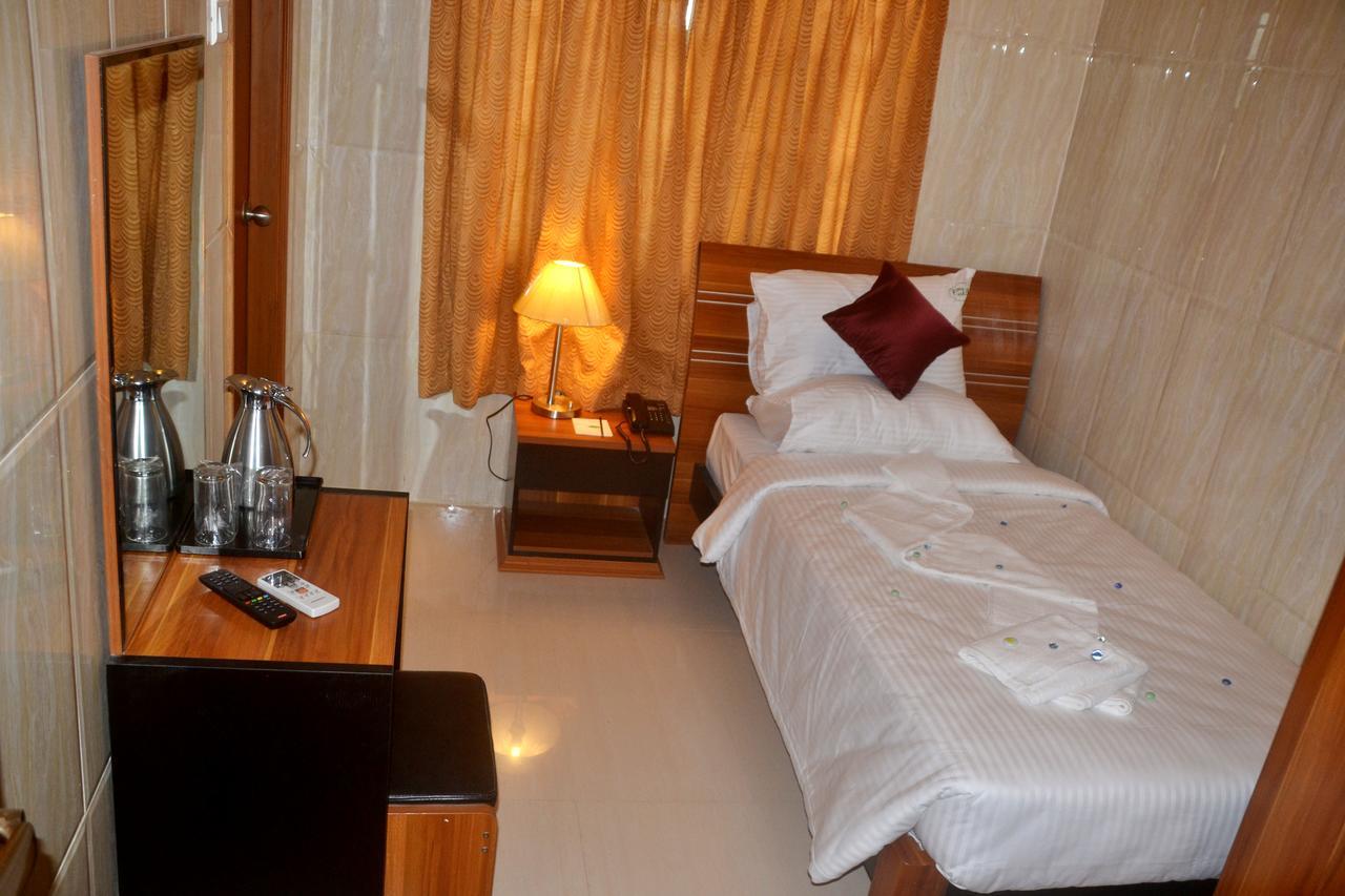 Peace Inn Chennai Oda fotoğraf